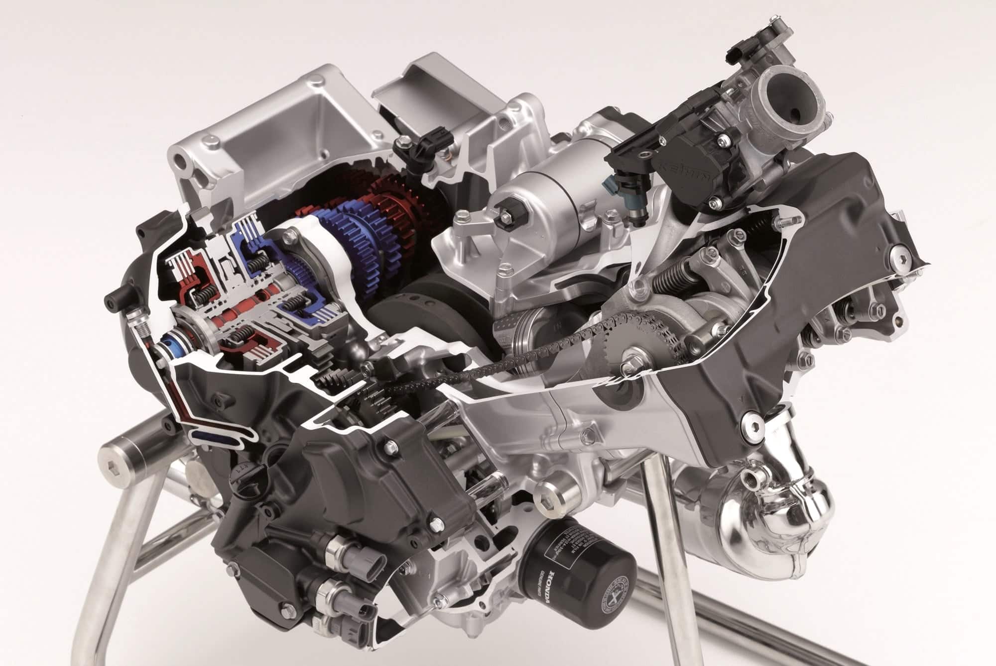 Automatic Motorcycle Transmissions Compared: DCT, AMT, E-Clutch and More 8 Honda 700 cc parallel-twin engine cutaway showing its integrated dual-clutch transmission