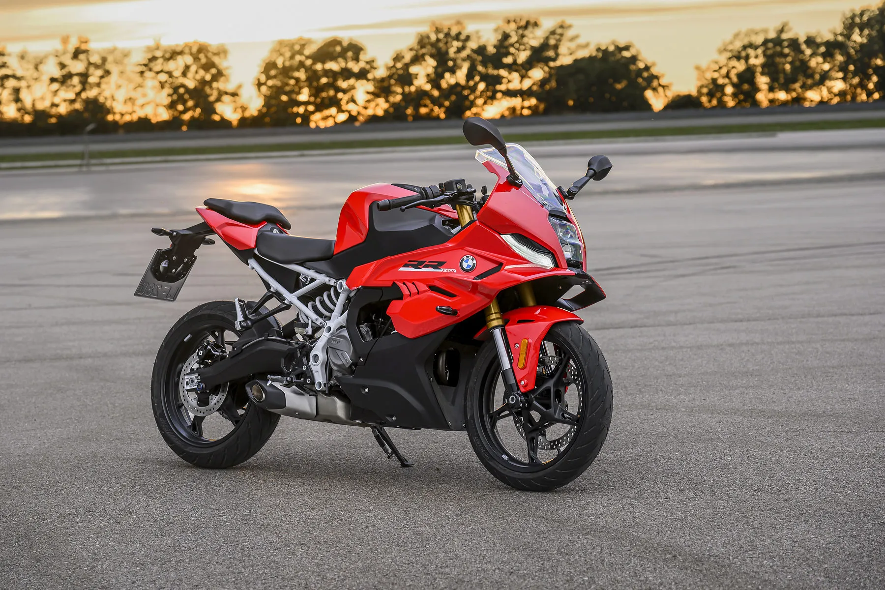 Complete List of All Motorcycles with Cornering ABS/IMU (2026) 7 BMW F 450 RR Sport with Brembo front brake, parked on a circuit apron