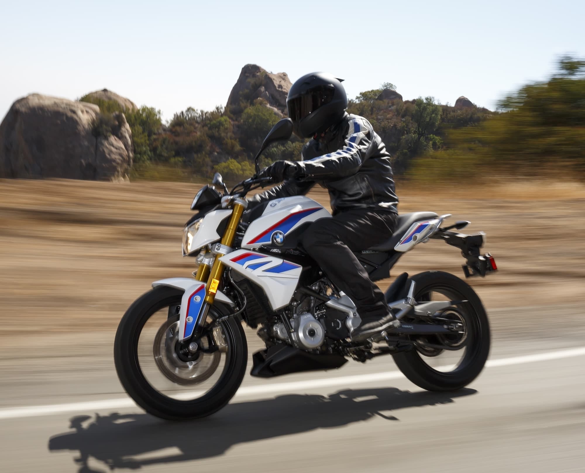 BMW F 450 R vs G 310 R: What changed? 4 Rider seated upright on a BMW G 310 R on the road
